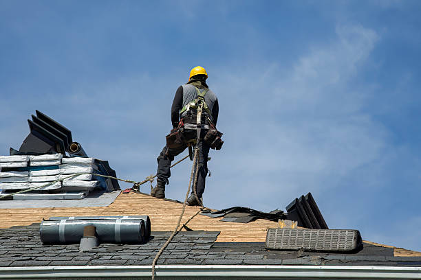 Professional Gutter Installation technician working in Big Rock, TN